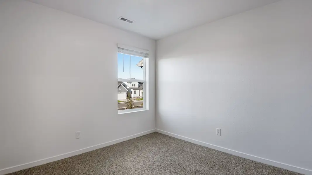 Spacious, unfurnished interior of a new home in Sky Ranch, Watkins (Image 15).