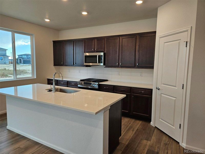 Furnished interior view inside a new home in The Cottages Collection at Ridgeline Vista, Brighton (Image 5). Furnished interior view inside a new home in The Cottages Collection at Ridgeline Vista, Brighton (Image 5).