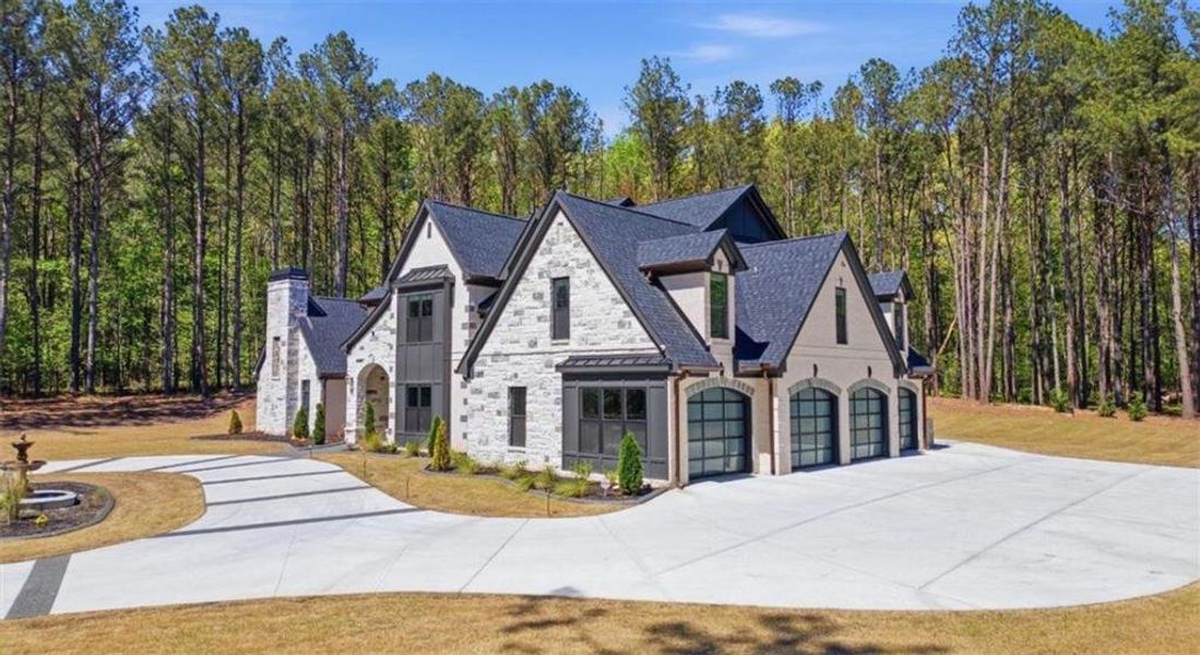 Front exterior of a new home in , Tyrone, GA, highlighting curb appeal (Image 21).