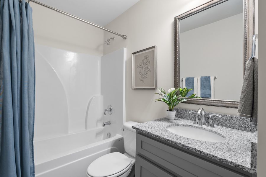 Representative furnished interior of a home built from the Palmetto II by McGuinn Homes in Clarke Townes, Anderson (Image 48).