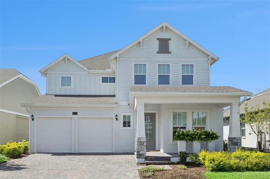 Front exterior of a new home in , Orlando, FL, highlighting curb appeal (Image 24). Front exterior of a new home in , Orlando, FL, highlighting curb appeal (Image 24).