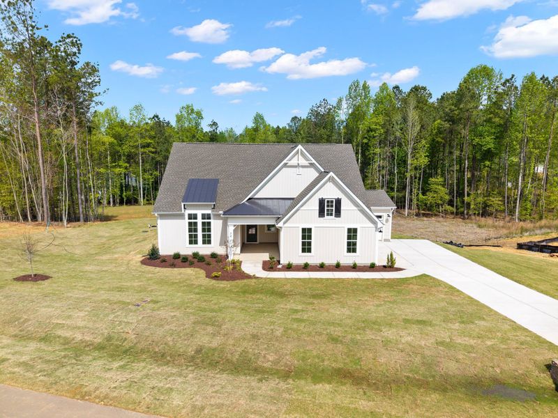 Representative exterior photo of a completed home built from the The Bradley by RobuckHomes in Baylee Ridge, Selma, NC (Image 56). Representative exterior photo of a completed home built from the The Bradley by RobuckHomes in Baylee Ridge, Selma, NC (Image 56).