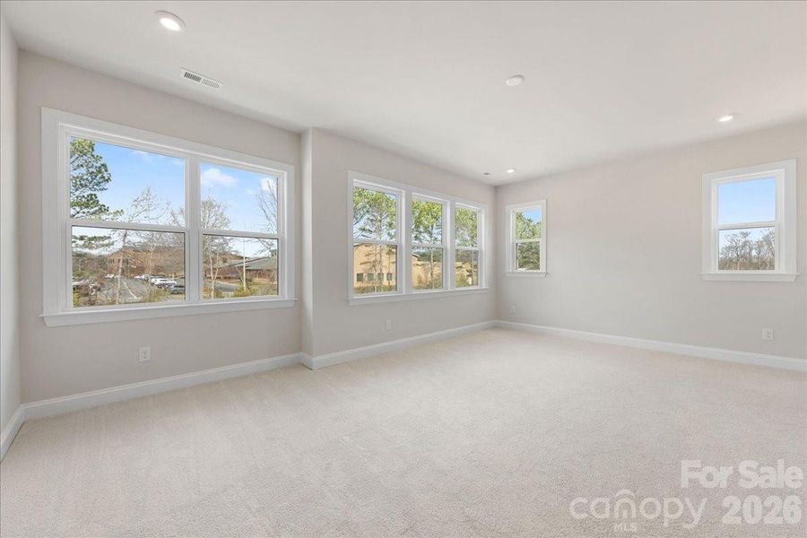 Light-filled primary bedroom