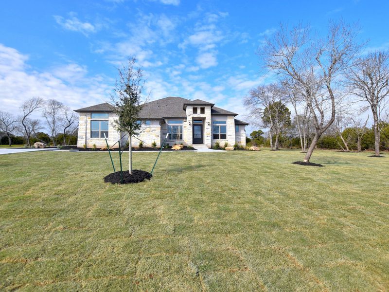 Representative exterior photo of a completed home built from the San Simeon I by Giddens Homes in Clearwater Ranch, Liberty Hill, TX (Image 47).