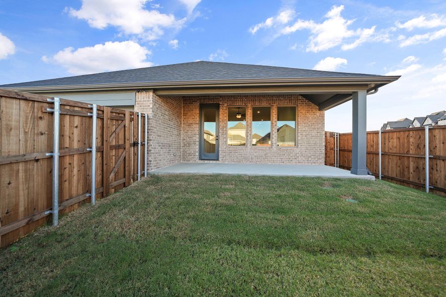 Exterior details and patio area of a home in Edgewater, Fate (Image 26).