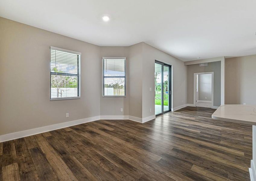 The dining area has plenty of natural light and is right off the kitchen