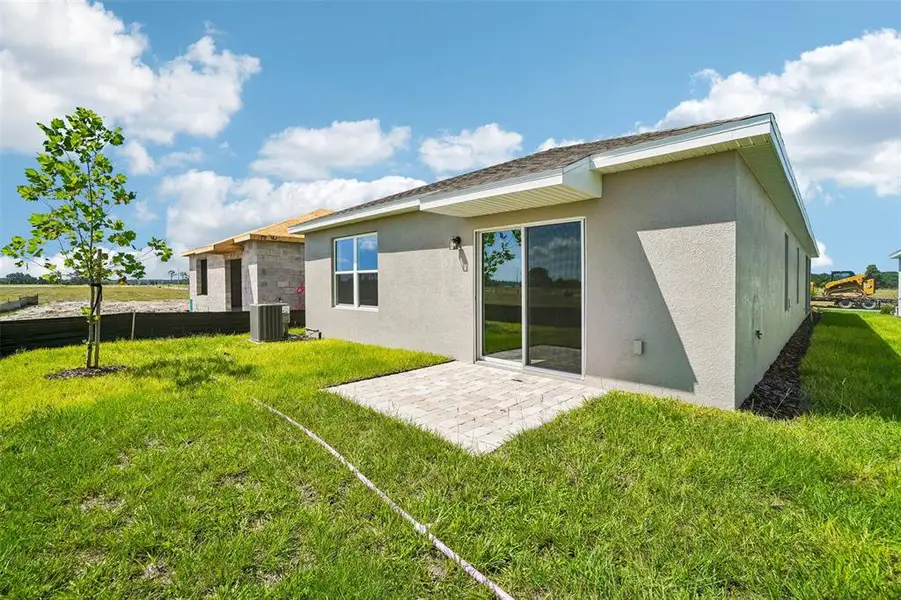 Exterior details and patio area of a home in Willowbrook North, Winter Haven (Image 3). Exterior details and patio area of a home in Willowbrook North, Winter Haven (Image 3).