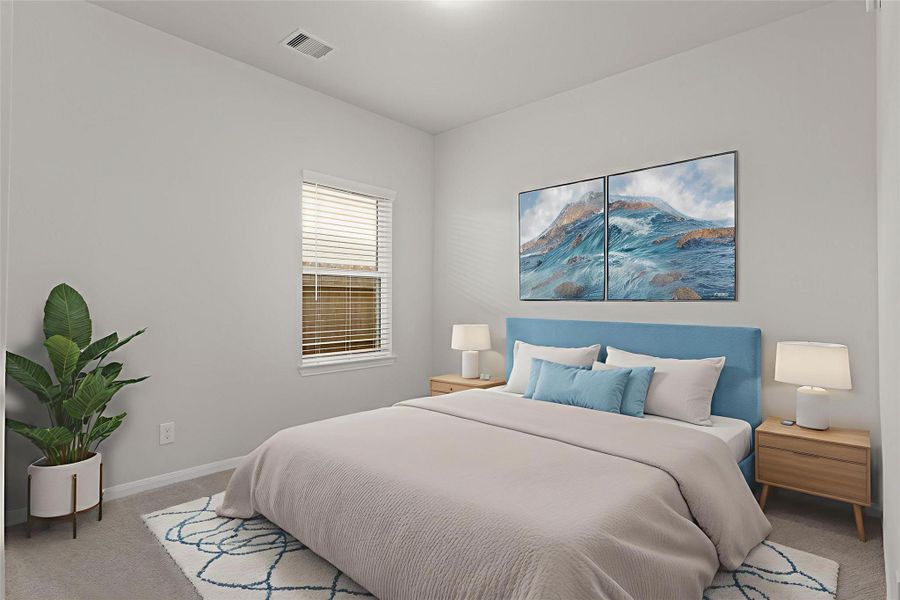 Virtually staged to highlight its versatility, this comfortable secondary bedroom offers soft neutral tones, plush carpet flooring, and plenty of space for a full furniture set—ideal for guests or family members.