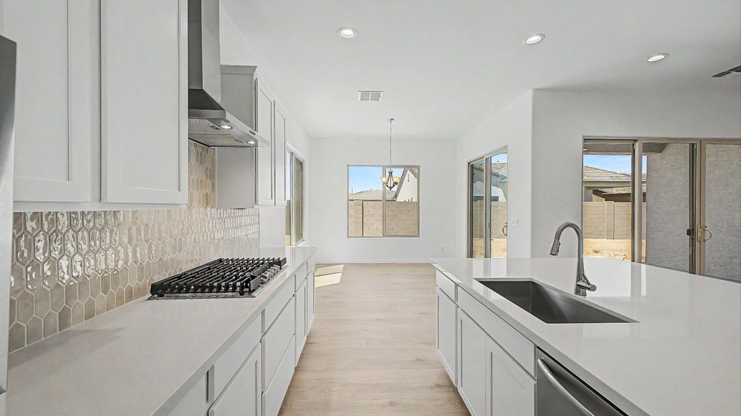 Furnished interior view inside a new home in Windrose, Waddell (Image 7).