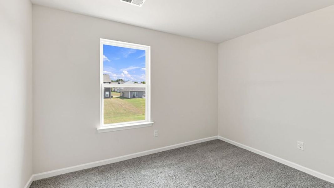 Spacious, unfurnished interior of a new home in Bentley Park, Greenwood (Image 25).