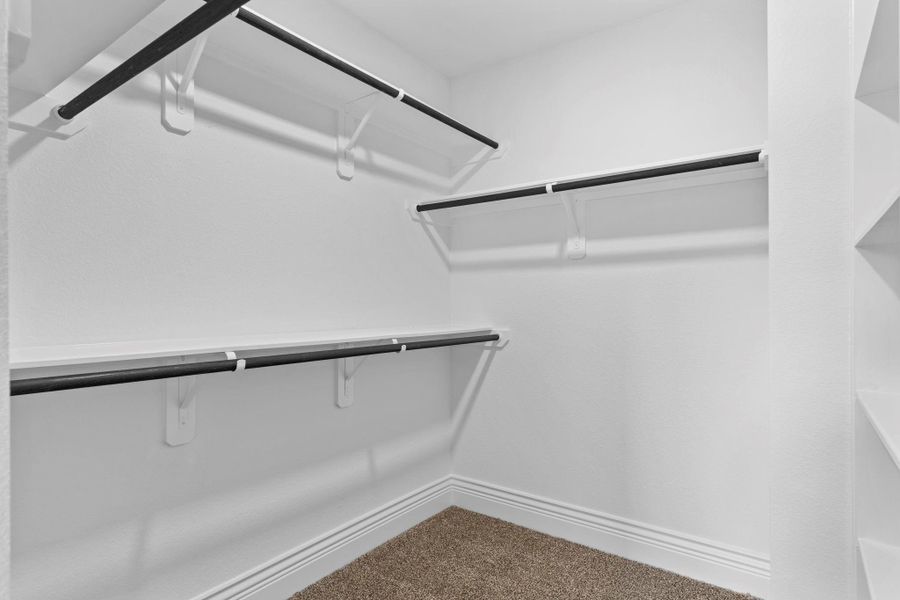 The primary suite has a massive walk-in closet; this is only half of the closet!  Look on documents and you will see how massive this closet truly is, or better call and let us show you today!