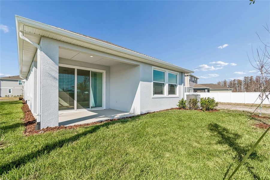 Exterior details and patio area of a home in Chapel Crossings - Garden Series, Wesley Chapel (Image 18). Exterior details and patio area of a home in Chapel Crossings - Garden Series, Wesley Chapel (Image 18).