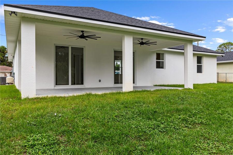 Exterior details and patio area of a home in , Lake Placid (Image 1).