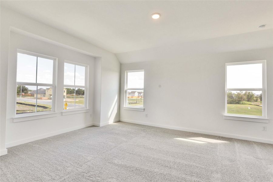 Unfurnished room with carpet, recessed lighting, and vaulted ceiling Unfurnished room with carpet, recessed lighting, and vaulted ceiling