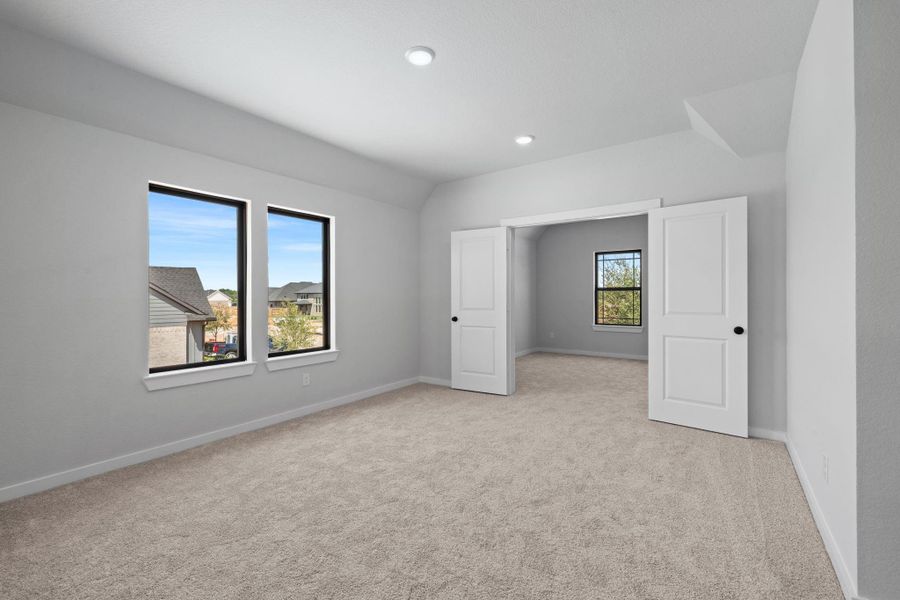 Large game room that leads to media room. Large game room that leads to media room.