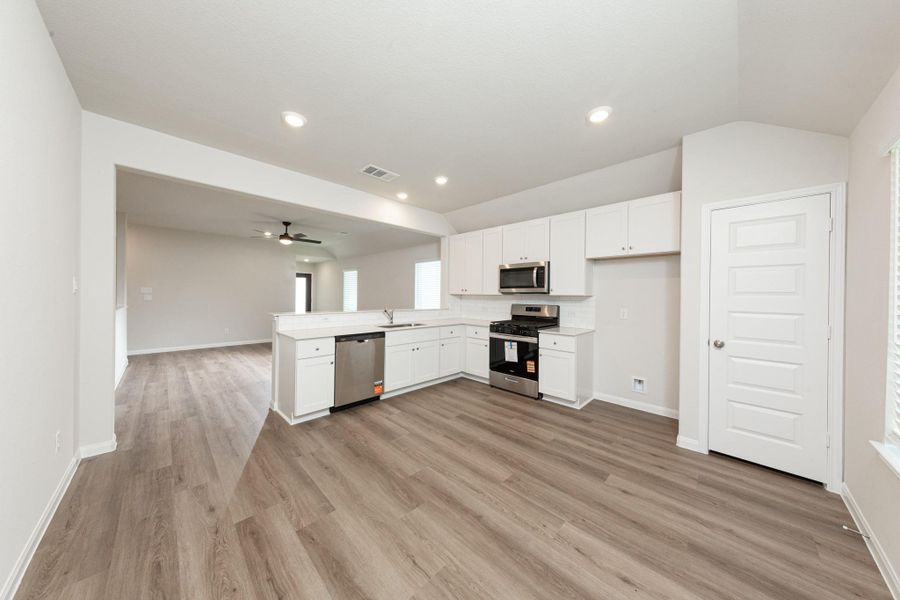 Furnished interior view inside a new home in Townsend Reserve, Splendora (Image 6).
