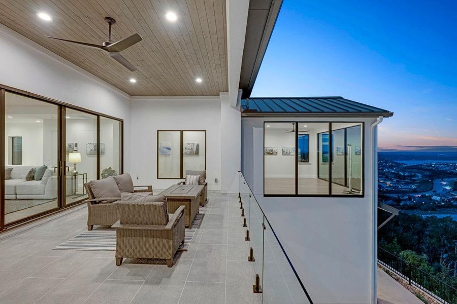 Spacious second level outdoor living area located off of the gameroom. Spacious second level outdoor living area located off of the gameroom.