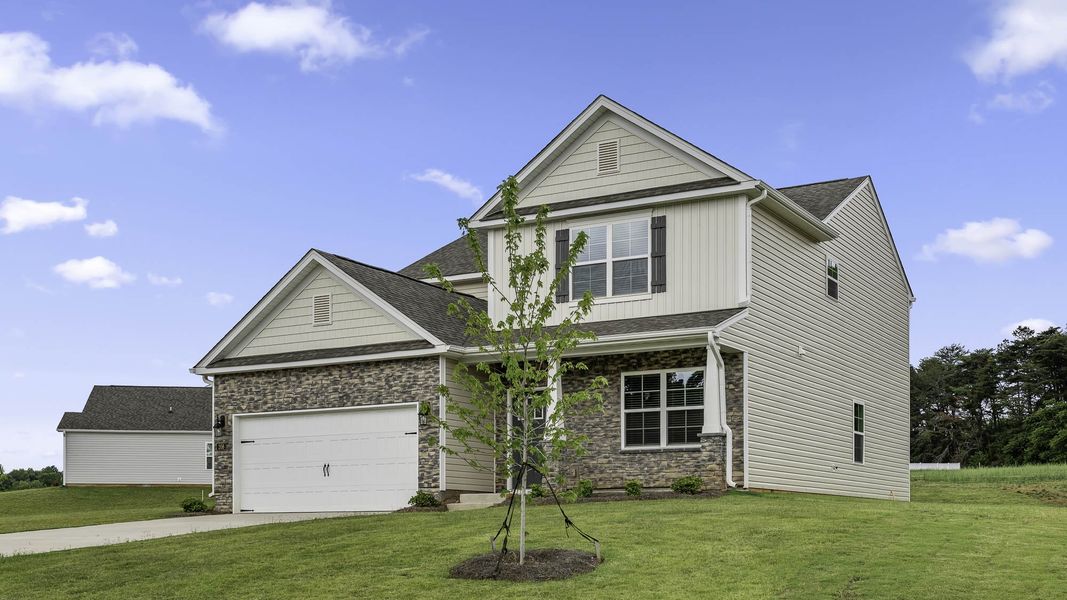 Front exterior of a new home in Forest Creek, Winston-Salem, NC, highlighting curb appeal (Image 16).
