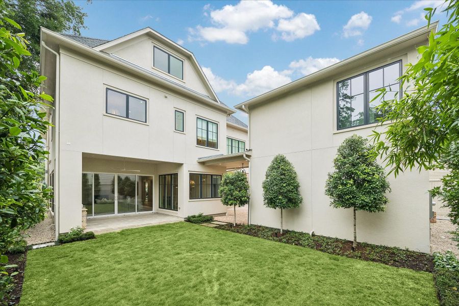 Exterior details and patio area of a home in , Houston (Image 3).