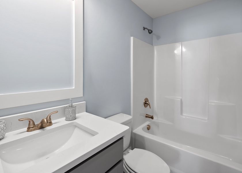 Furnished interior view inside a new home in Osprey Landing, Southport (Image 19).