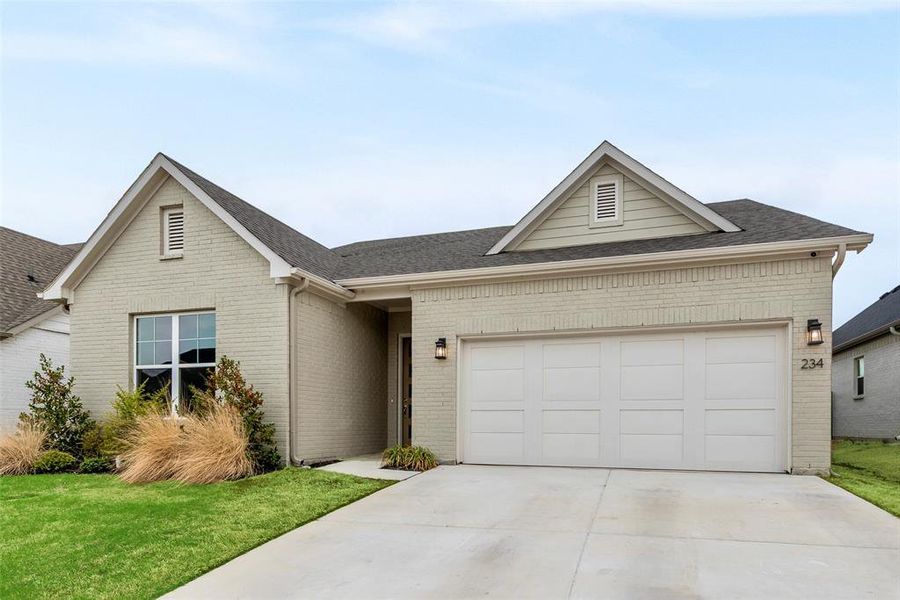 Front exterior of a new home in , Aledo, TX, highlighting curb appeal (Image 23).