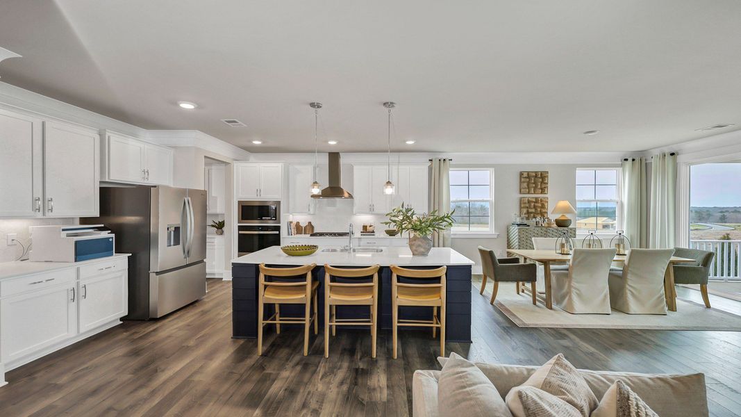 Representative furnished interior of a home built from the Harbor Oak by D.R. Horton in Lake Tide Summit, Chapin (Image 15).