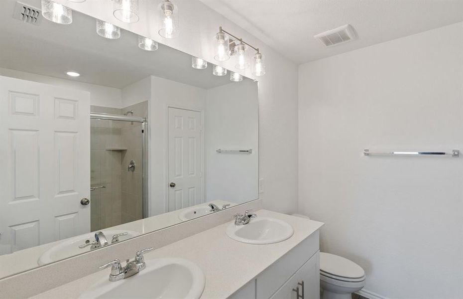 Owner's bath with oversized shower*real home pictured