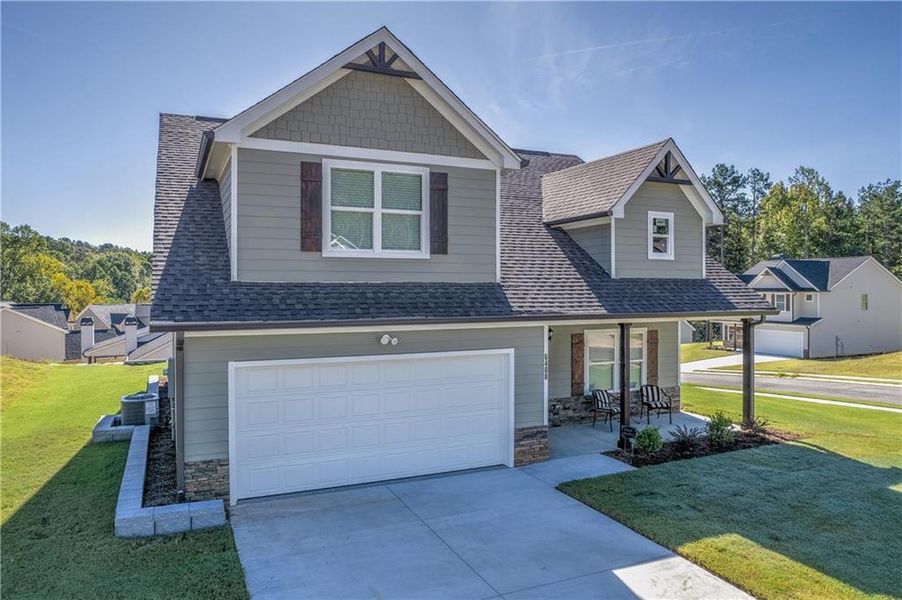 Front exterior of a new home in , Lula, GA, highlighting curb appeal (Image 26).