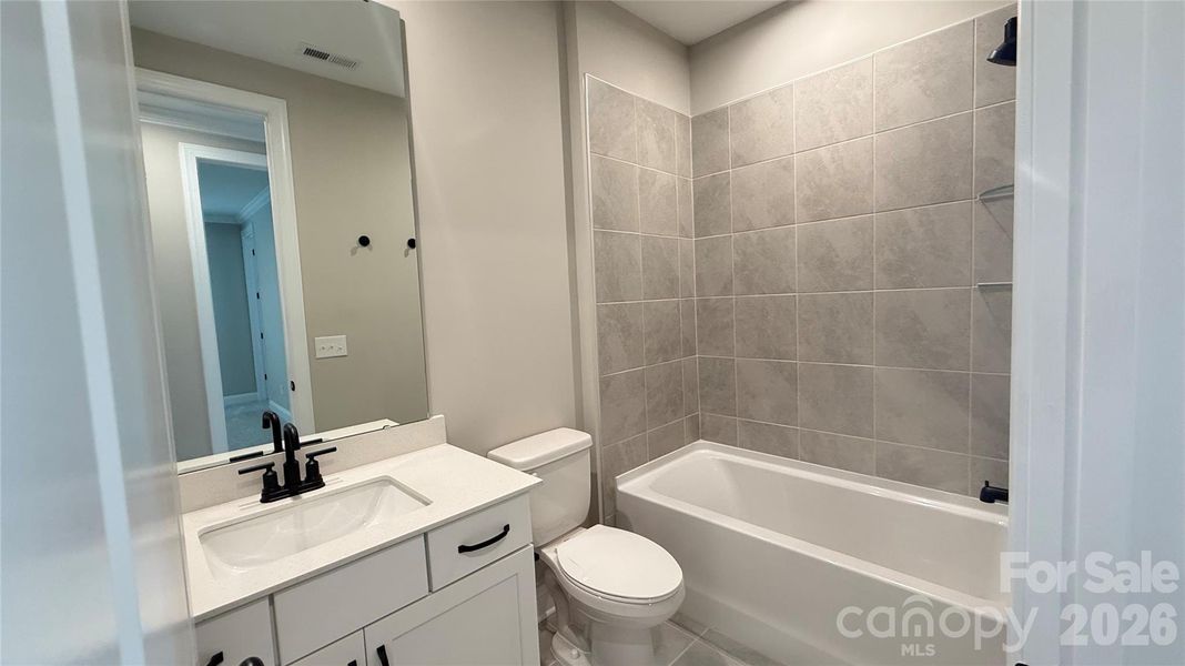 Furnished interior view inside a new home in The Townes at Wade Ardrey, Charlotte (Image 17).