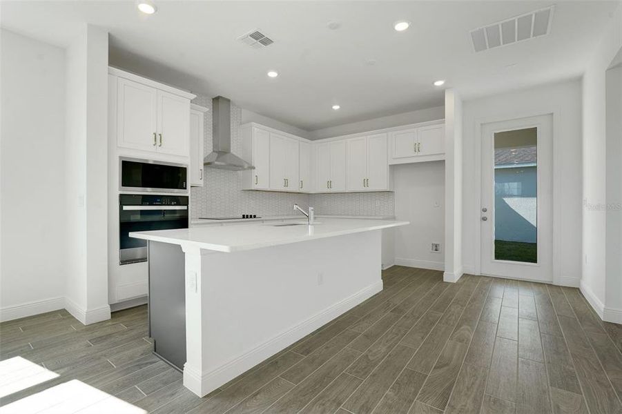 Furnished interior view inside a new home in Crossroads at Kelly Park, Apopka (Image 12). Furnished interior view inside a new home in Crossroads at Kelly Park, Apopka (Image 12).