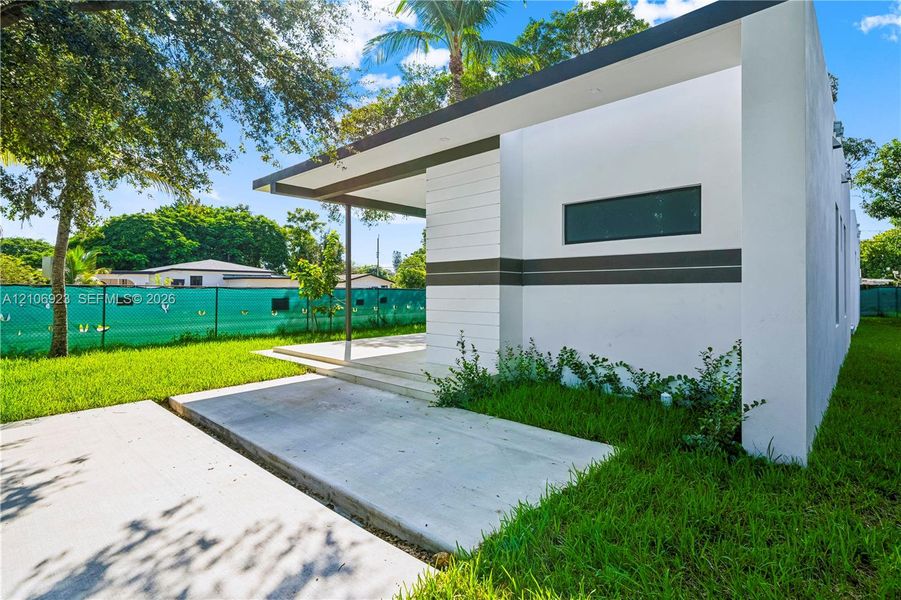 Exterior details and patio area of a home in , Opa Locka (Image 25). Exterior details and patio area of a home in , Opa Locka (Image 25).