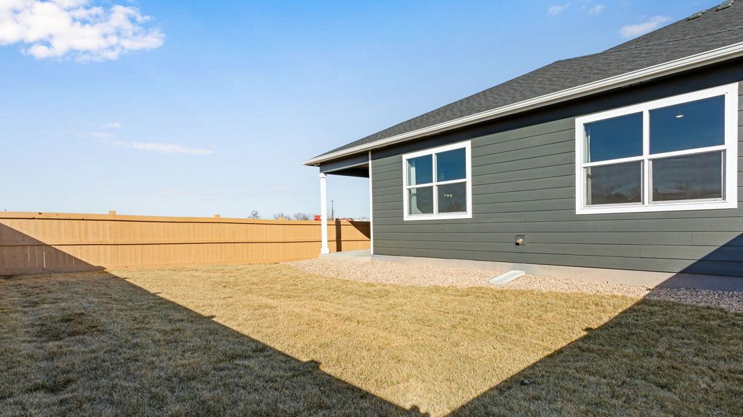 Exterior details and patio area of a home in Trevenna, Windsor (Image 4).
