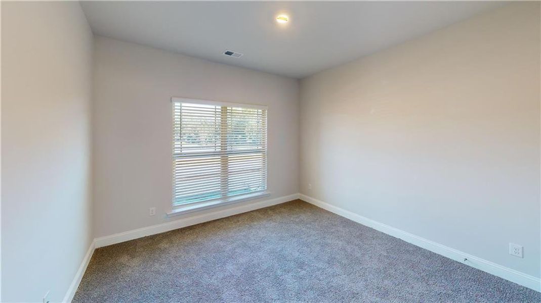 Spacious, unfurnished interior of a new home in Holliday Pass, Griffin (Image 29).