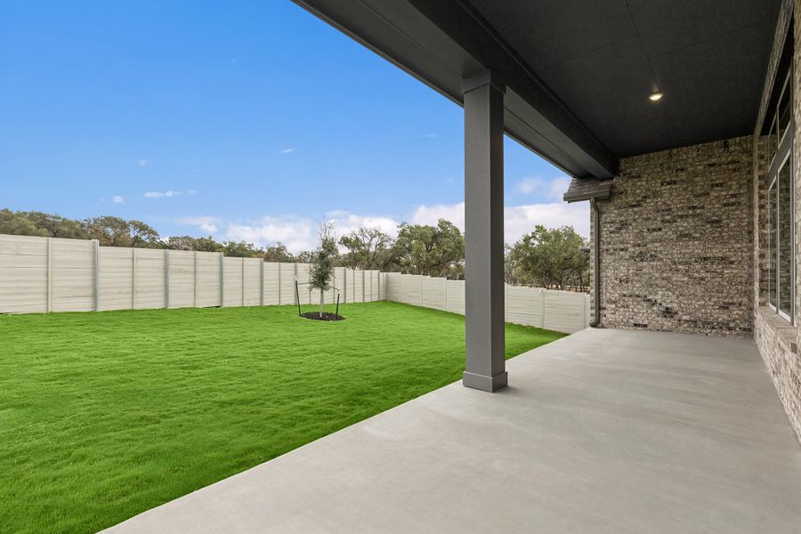 Exterior details and patio area of a home in Wolf Ranch – West Bend, Georgetown (Image 4).