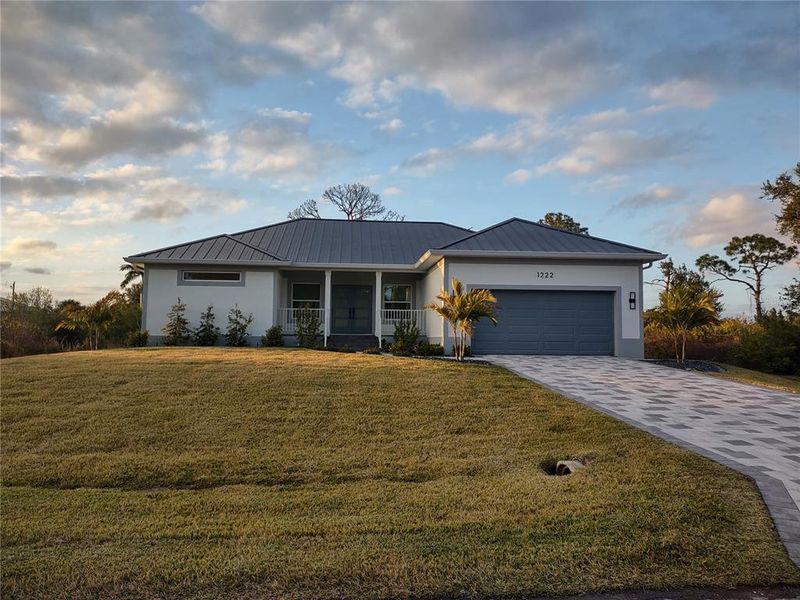 Front exterior of a new home in , Port Charlotte, FL, highlighting curb appeal (Image 25). Front exterior of a new home in , Port Charlotte, FL, highlighting curb appeal (Image 25).