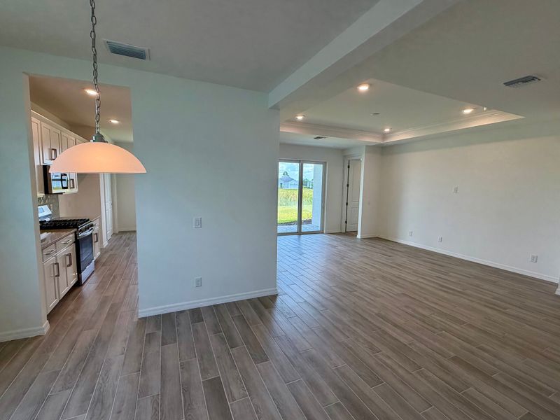 Representative unfurnished interior of a home built from the Juno by William Ryan Homes in The Sanctuary – Resort Collection, Punta Gorda (Image 19).