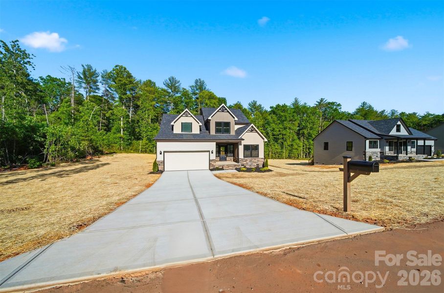 Front exterior of a new home in , Morganton, NC, highlighting curb appeal (Image 16). Front exterior of a new home in , Morganton, NC, highlighting curb appeal (Image 16).