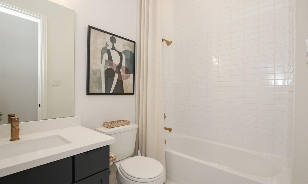 Furnished interior view inside a new home in Coastal Point, League City (Image 13).