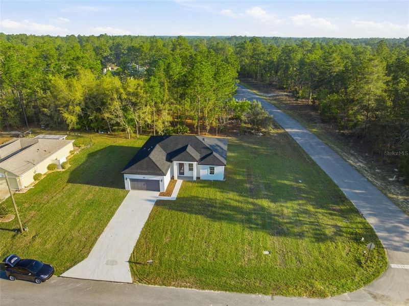 Front exterior of a new home in , Dunnellon, FL, highlighting curb appeal (Image 21). Front exterior of a new home in , Dunnellon, FL, highlighting curb appeal (Image 21).