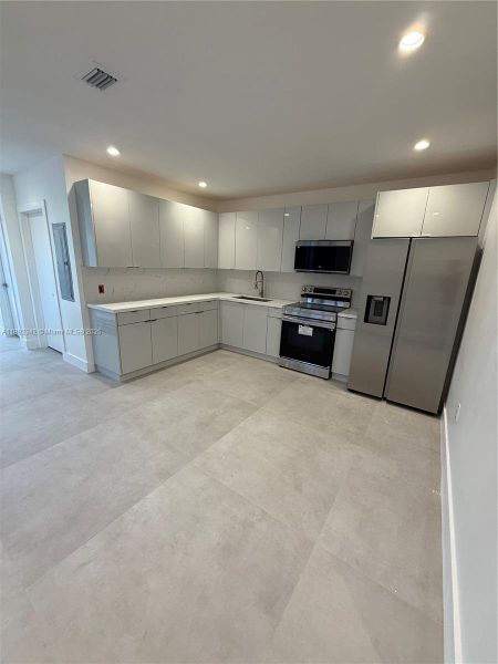 Spacious, unfurnished interior of a new home in , Miami (Image 6). Spacious, unfurnished interior of a new home in , Miami (Image 6).