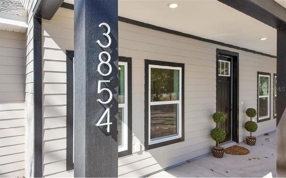 Exterior details and patio area of a home in , Lake City (Image 35).