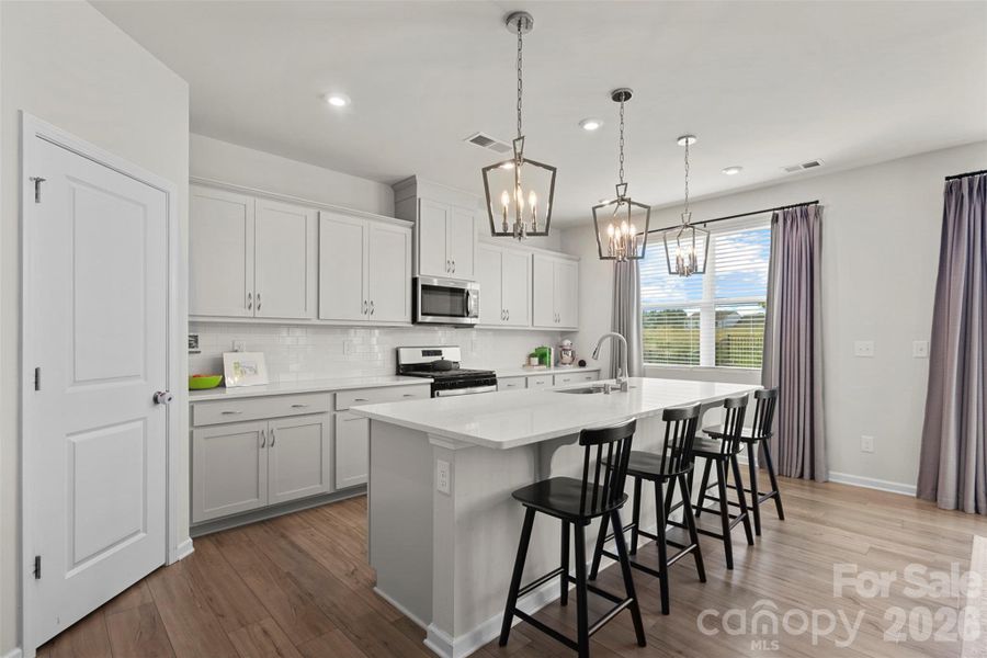 Spacious kitchen with large island Spacious kitchen with large island