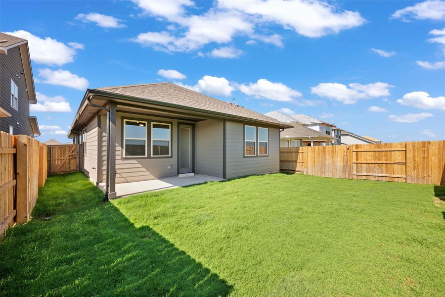 Exterior details and patio area of a home in The Trails at Carmel, Pflugerville (Image 27).
