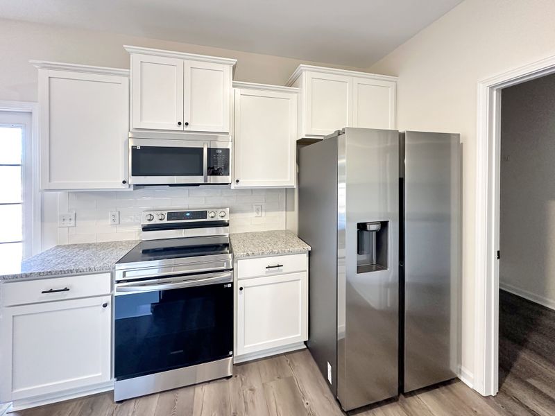Furnished interior view inside a new home in The Village at Sassafras, Allenhurst (Image 6). Furnished interior view inside a new home in The Village at Sassafras, Allenhurst (Image 6).