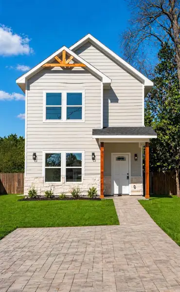 Front exterior of a new home in , Montgomery, TX, highlighting curb appeal (Image 6). Front exterior of a new home in , Montgomery, TX, highlighting curb appeal (Image 6).