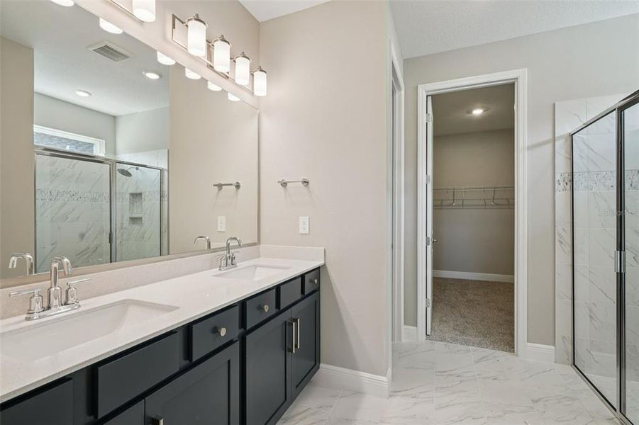 Furnished interior view inside a new home in Legends Preserve - Signature Series, Daytona Beach (Image 11). Furnished interior view inside a new home in Legends Preserve - Signature Series, Daytona Beach (Image 11).