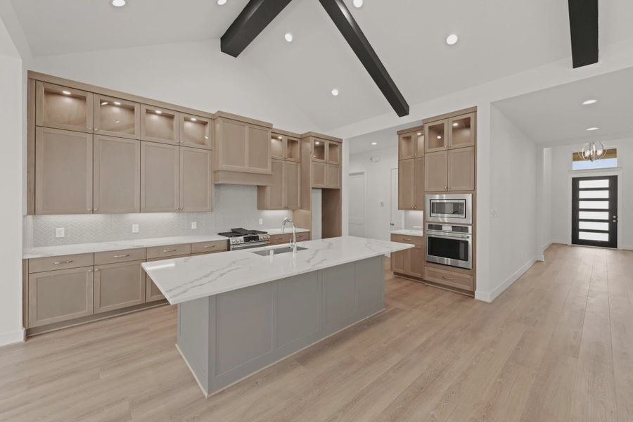 Representative furnished interior of a home built from the Malibu by Chesmar Homes in Meridiana 50's and 60's, Manvel (Image 5).