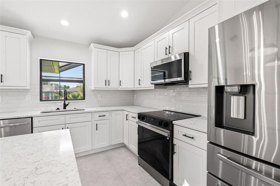Furnished interior view inside a new home in , Port Charlotte (Image 11).
