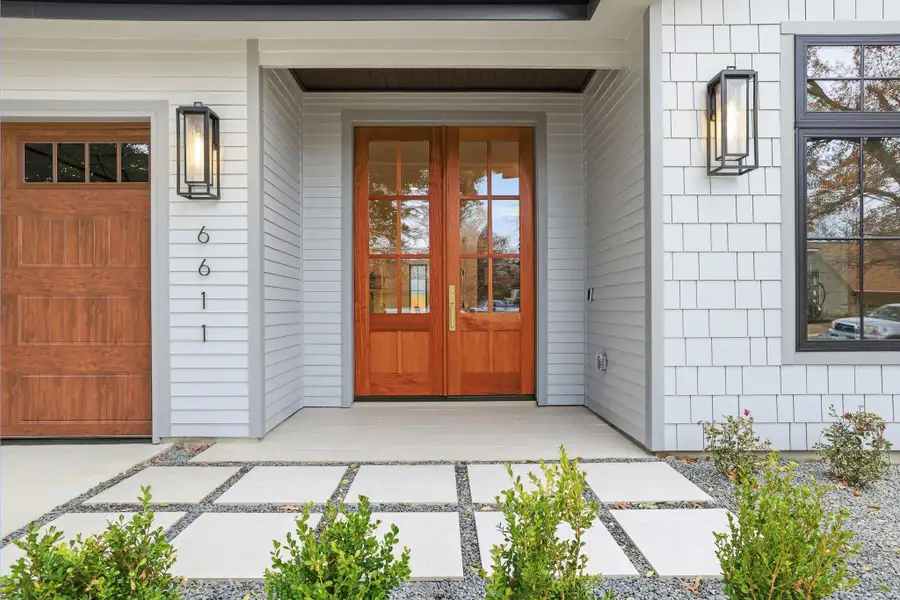 Doorway to property with french doors and covered porch