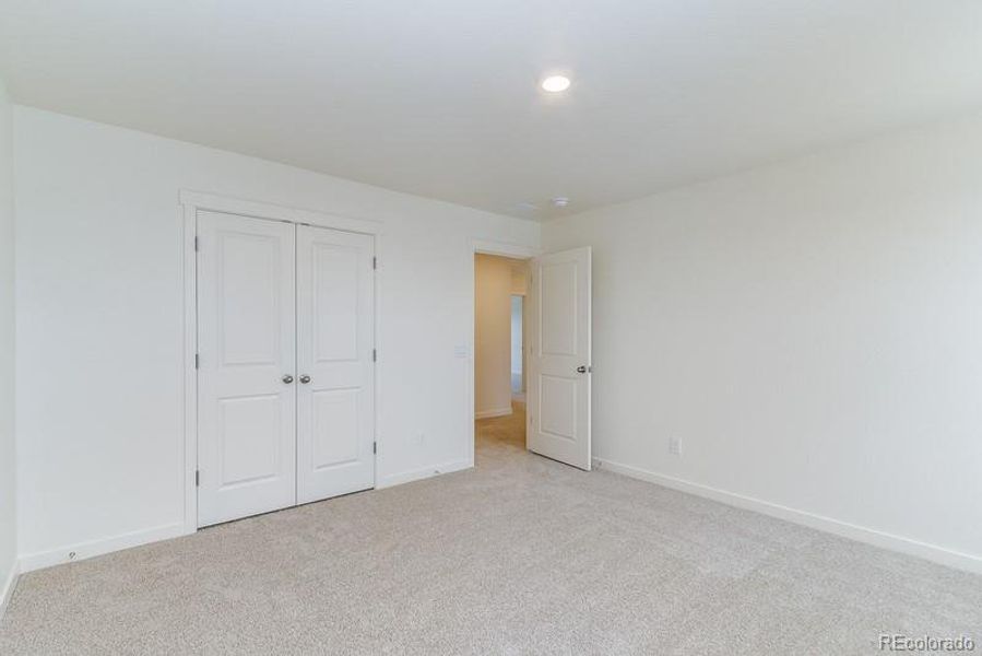 Spacious, unfurnished interior of a new home in Sky Ranch, Watkins (Image 15).